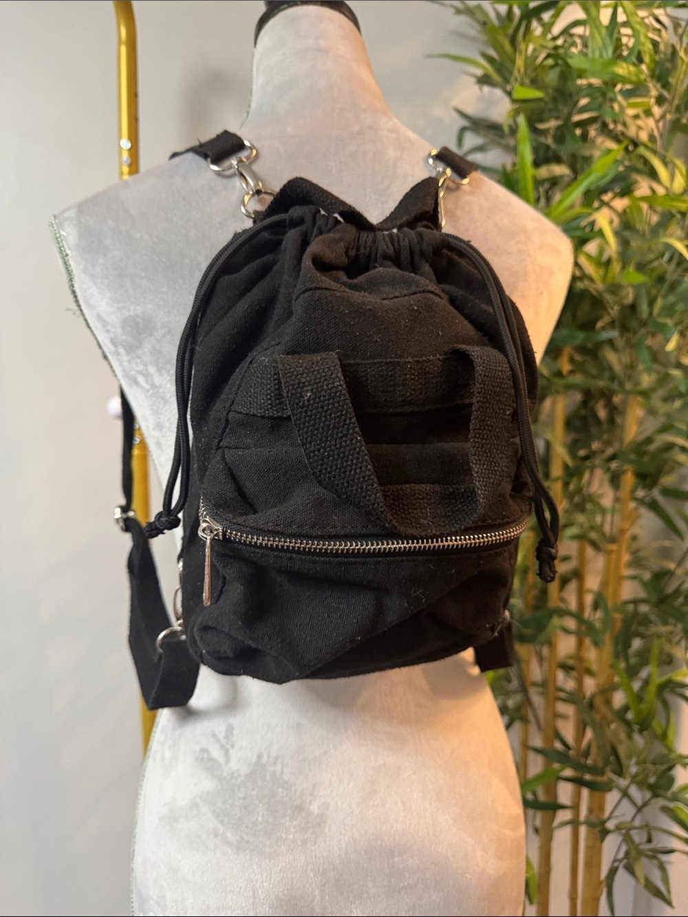 Madden Girl Black Canvas Drawstring Backpack with Front Zip Pocket